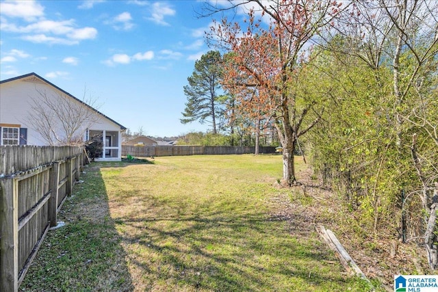 view of yard featuring a fenced backyard