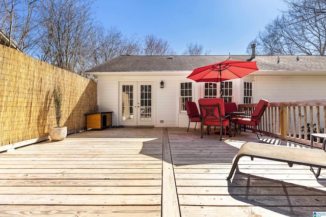 wooden terrace featuring french doors