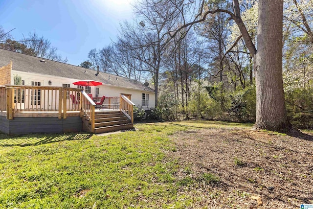 view of yard with a deck