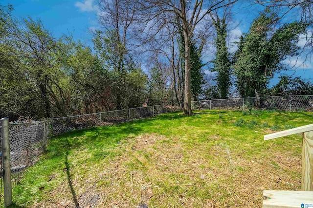 view of yard with a fenced backyard