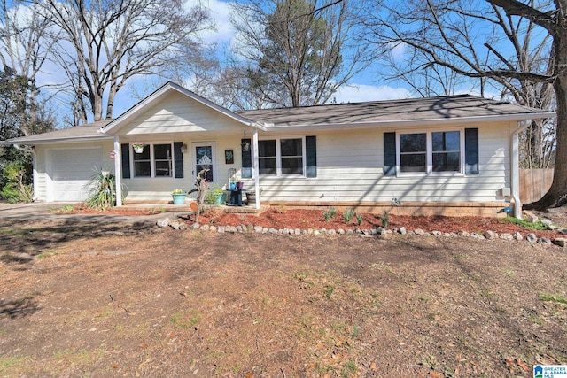 ranch-style home with a garage