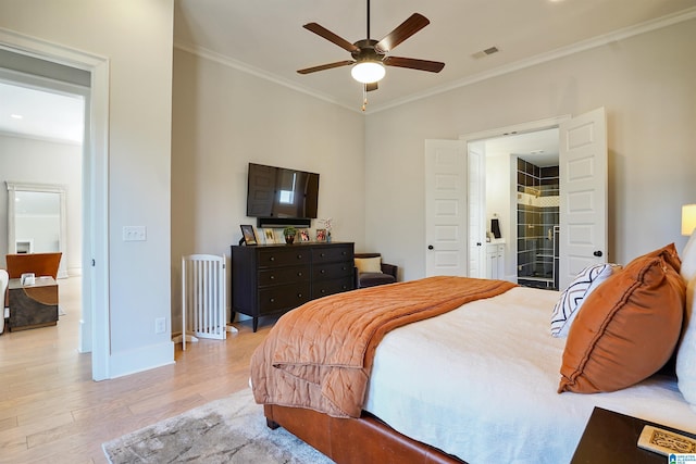 bedroom featuring baseboards, visible vents, ceiling fan, ornamental molding, and light wood-type flooring