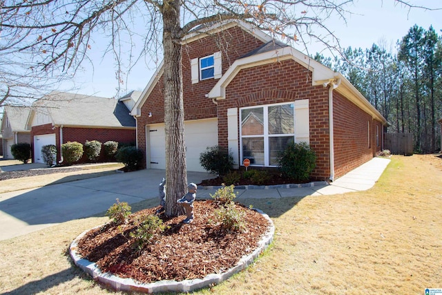 view of front of property with brick siding, an attached garage, concrete driveway, and a front lawn