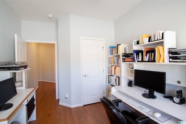 office space with baseboards and wood finished floors