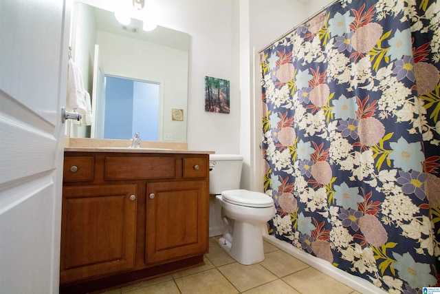 bathroom with vanity, visible vents, tile patterned flooring, curtained shower, and toilet