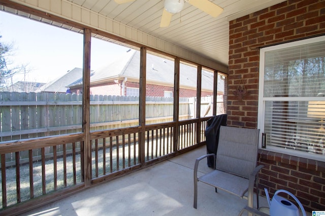 sunroom / solarium with ceiling fan