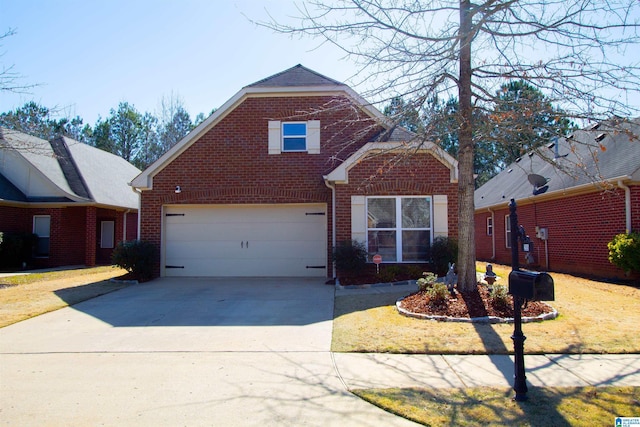 traditional home featuring concrete driveway, a garage, and brick siding