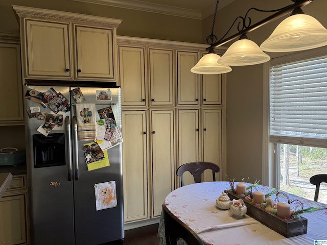 dining area with crown molding