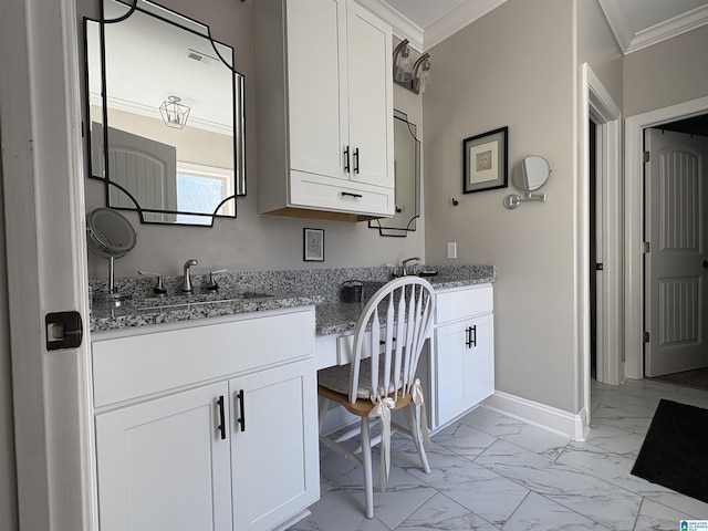 bathroom featuring baseboards, marble finish floor, ornamental molding, and vanity