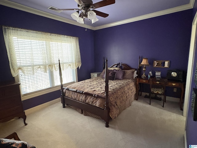 bedroom featuring baseboards, carpet floors, ceiling fan, and crown molding