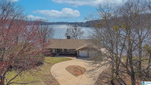 exterior space with a water view