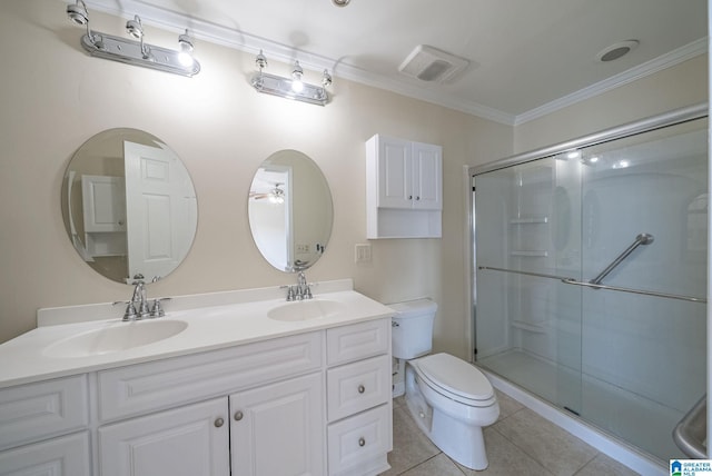 bathroom featuring toilet, a stall shower, and a sink