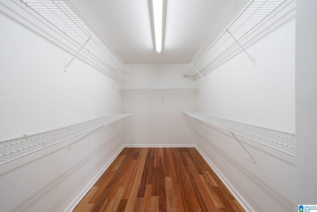 spacious closet with wood finished floors