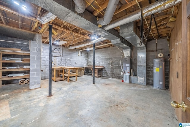 unfinished basement featuring heating unit and water heater