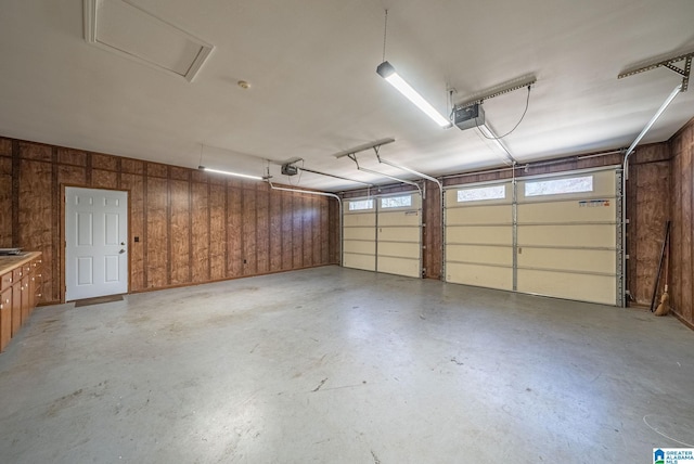 garage featuring a garage door opener