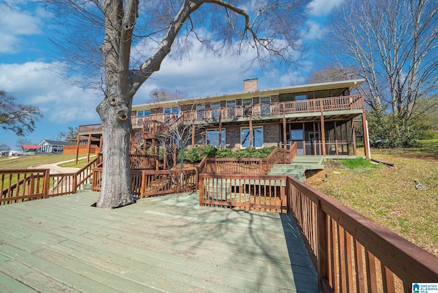 wooden terrace with a sunroom