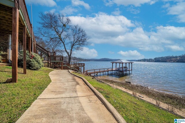 view of dock with a water view