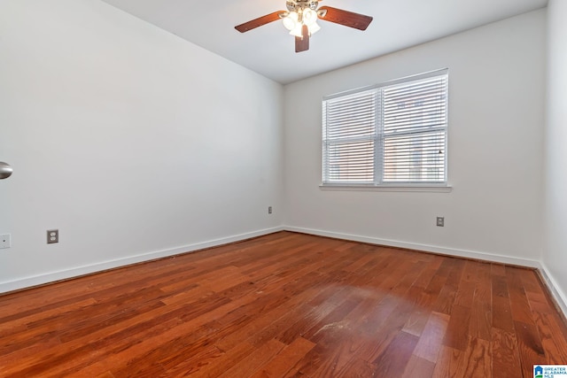 401 20th St S Unit 309, Birmingham, AL 35233 - unfurnished room featuring wood finished floors, baseboards, and ceiling fan