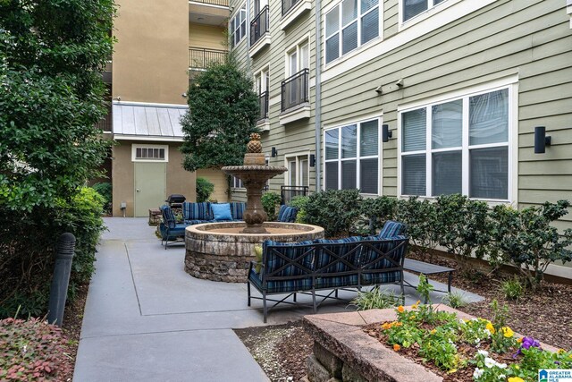 401 20th St S Unit 309, Birmingham, AL 35233 - view of property's community with a patio