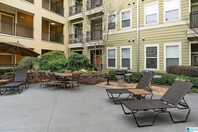 401 20th St S Unit 309, Birmingham, AL 35233 - view of patio featuring grilling area and outdoor dining area