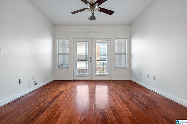401 20th St S Unit 309, Birmingham, AL 35233 - empty room with french doors, baseboards, wood finished floors, and a ceiling fan