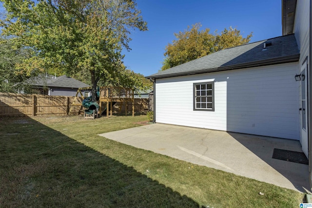 view of yard featuring a patio area and a fenced backyard