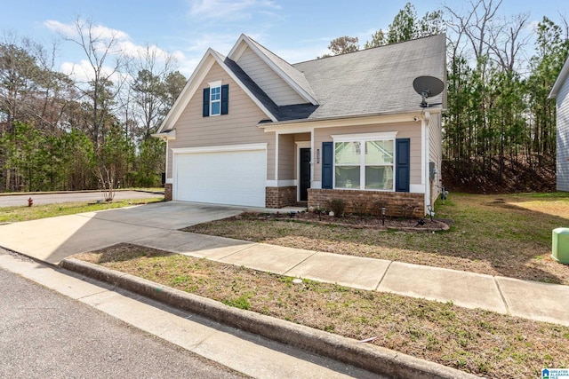 view of front of home with a garage, brick siding, and driveway