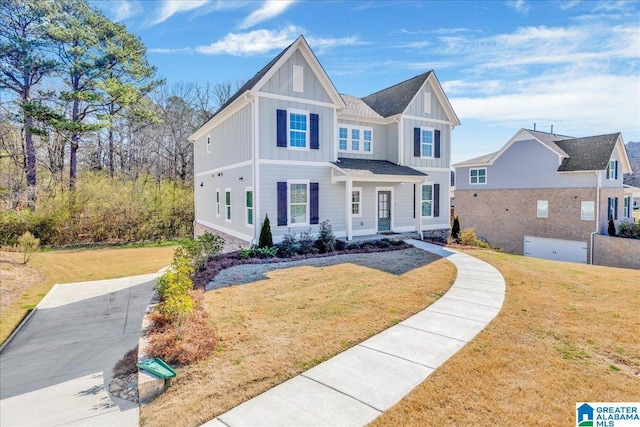 view of front of property featuring board and batten siding and a front lawn