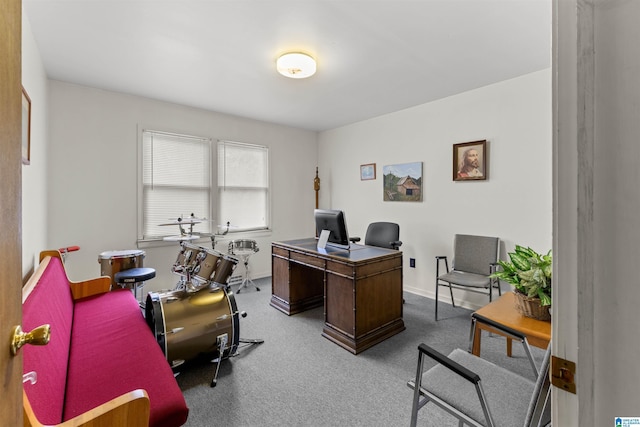 home office with baseboards and carpet