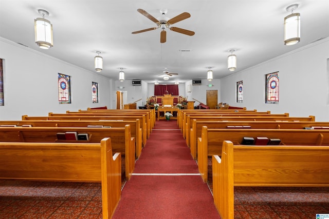 misc room featuring visible vents, carpet, crown molding, and ceiling fan