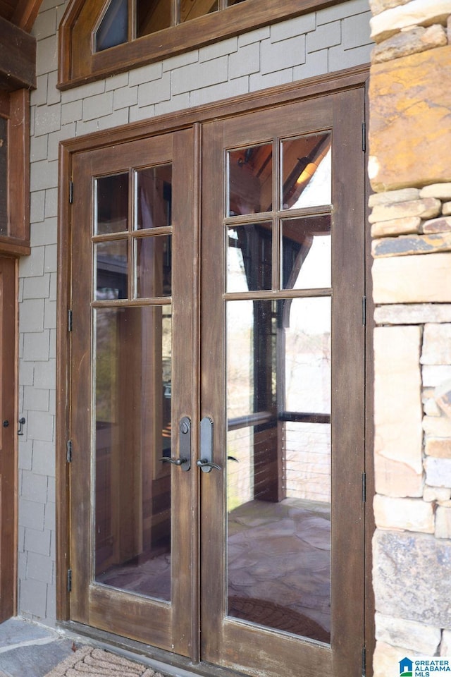 property entrance featuring french doors