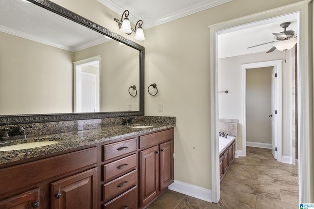 bathroom featuring ceiling fan, ornamental molding, and a sink