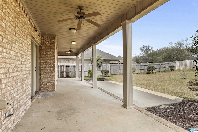 view of patio / terrace with a fenced backyard and a ceiling fan