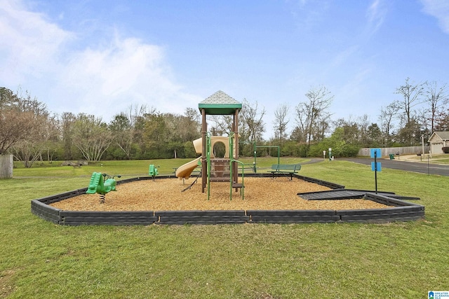 communal playground featuring a lawn