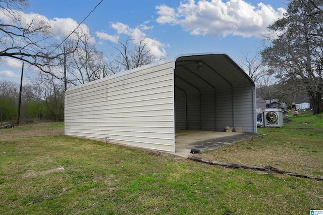 view of outbuilding with a detached carport