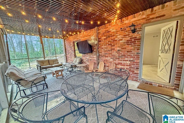 view of patio / terrace featuring visible vents and an outdoor living space