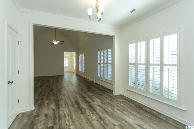 empty room featuring visible vents, crown molding, vaulted ceiling, ceiling fan with notable chandelier, and dark wood-style floors