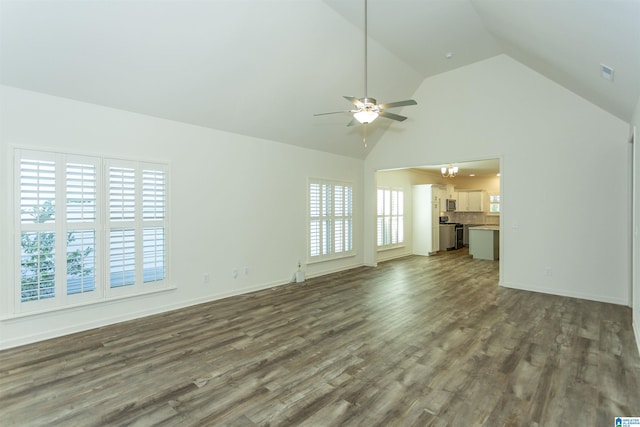 unfurnished living room featuring high vaulted ceiling, baseboards, dark wood-style flooring, and ceiling fan