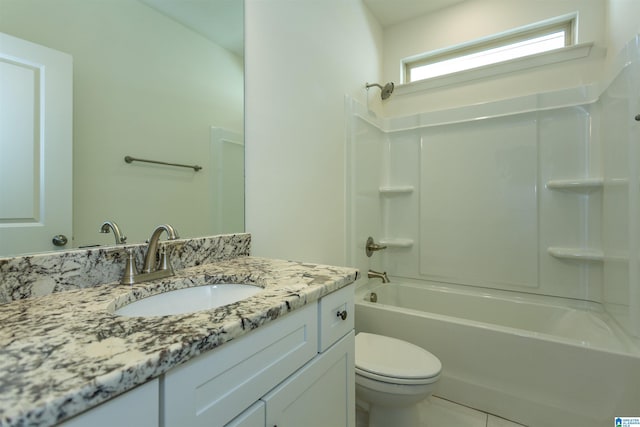 bathroom featuring vanity, toilet, and bathtub / shower combination