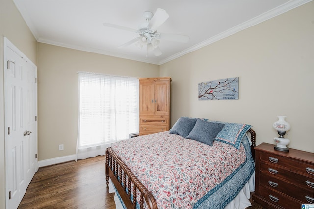 bedroom with ceiling fan, dark wood-type flooring, baseboards, and ornamental molding