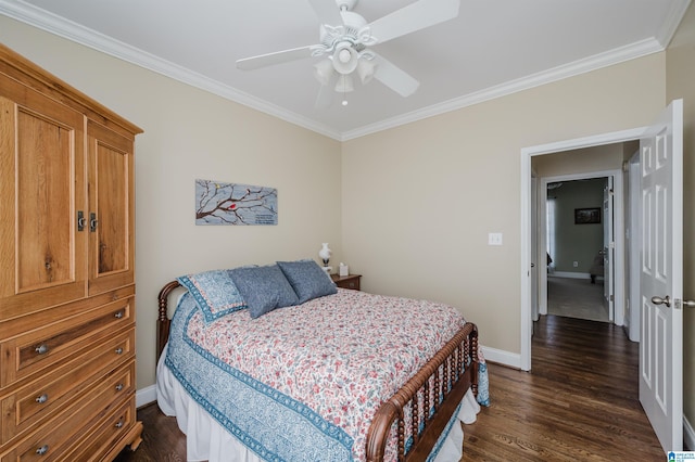 bedroom featuring a ceiling fan, dark wood-type flooring, baseboards, and ornamental molding