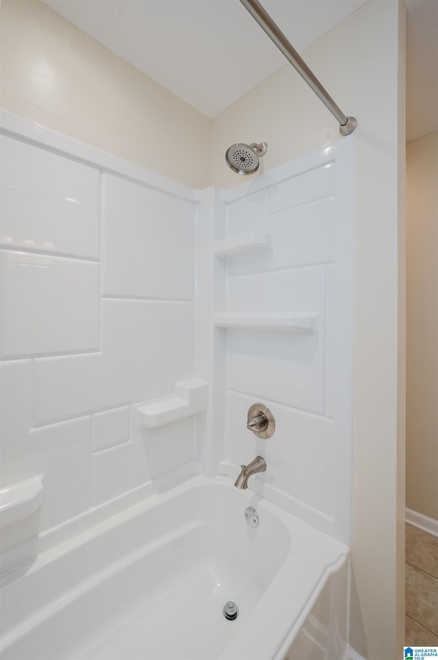 bathroom with shower / bathing tub combination and tile patterned flooring