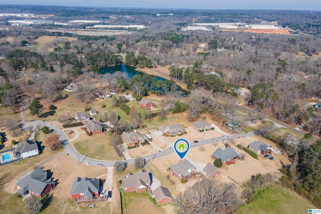 birds eye view of property with a residential view and a water view