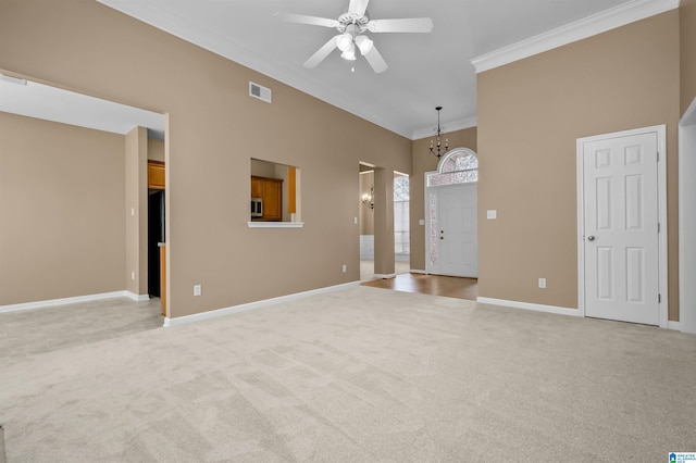 interior space featuring visible vents, baseboards, ornamental molding, light carpet, and ceiling fan with notable chandelier