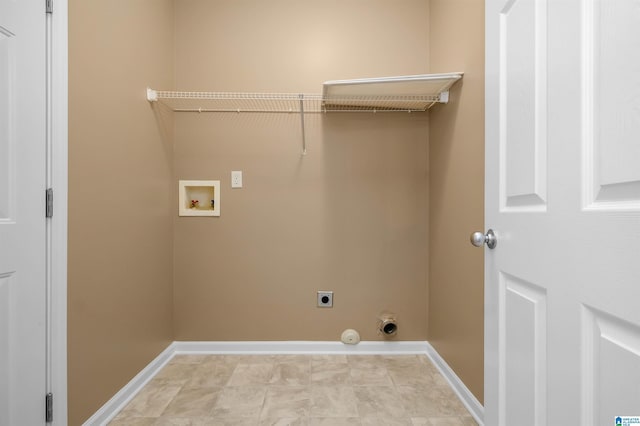 laundry room featuring baseboards, gas dryer hookup, laundry area, hookup for a washing machine, and electric dryer hookup