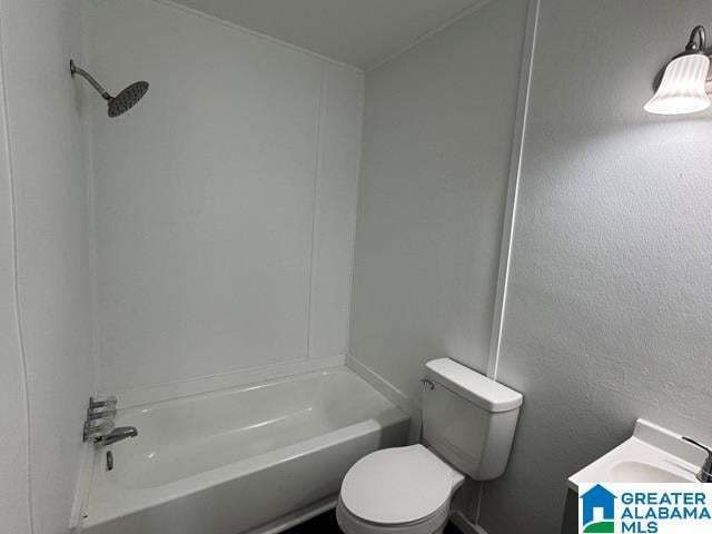 bathroom with shower / tub combination and toilet