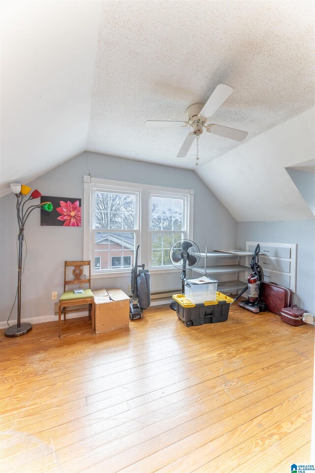 819 Jefferson Ave, Anniston, AL 36207 - bonus room featuring lofted ceiling, a textured ceiling, hardwood / wood-style floors, and a ceiling fan