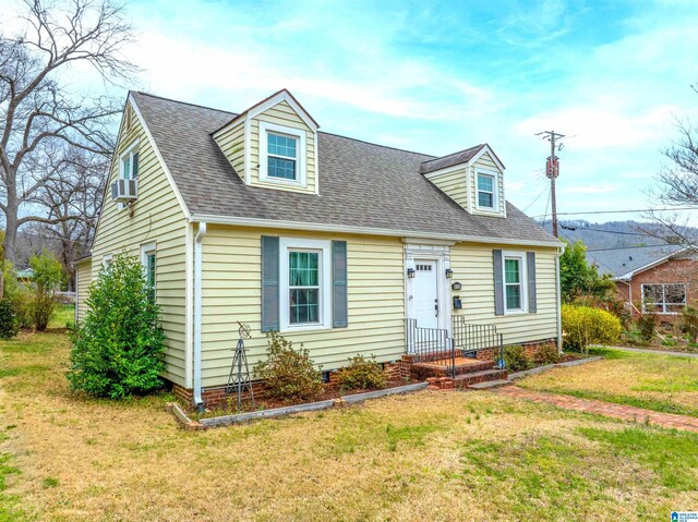 819 Jefferson Ave, Anniston, AL 36207 - cape cod home with a shingled roof and a front yard