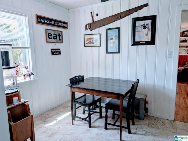 5242 Roy Dr, Helena, AL 35080 - dining space featuring a decorative wall and baseboards