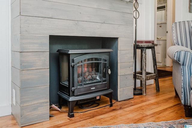 5242 Roy Dr, Helena, AL 35080 - detailed view of a wood stove and wood finished floors